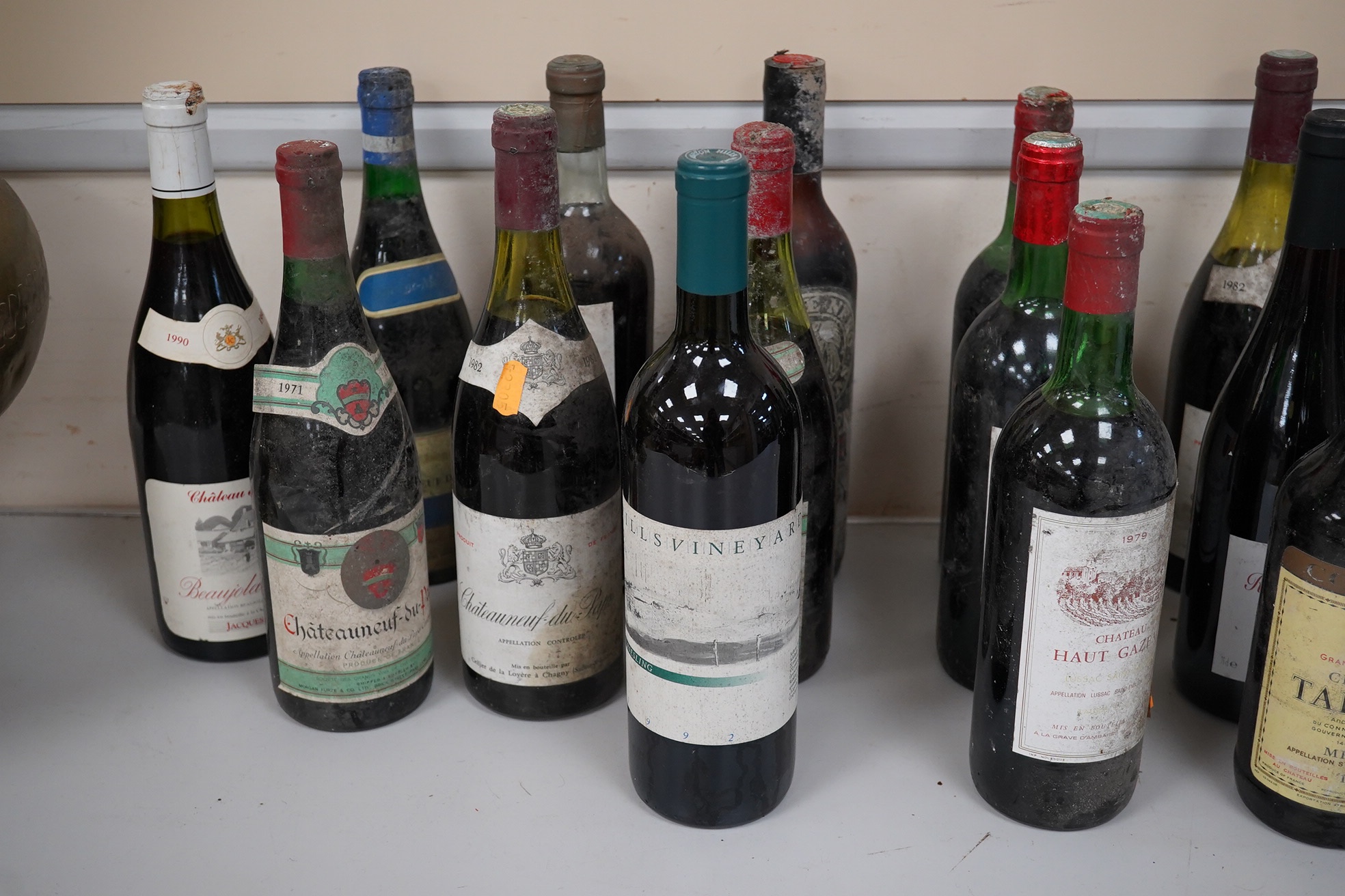 Collection of mixed wine to include Chateauneuf du Pape 1979, 1982, 1969, Chateau Carras 1978 and Chateau Haut Gazeau. Condition - storage unknown